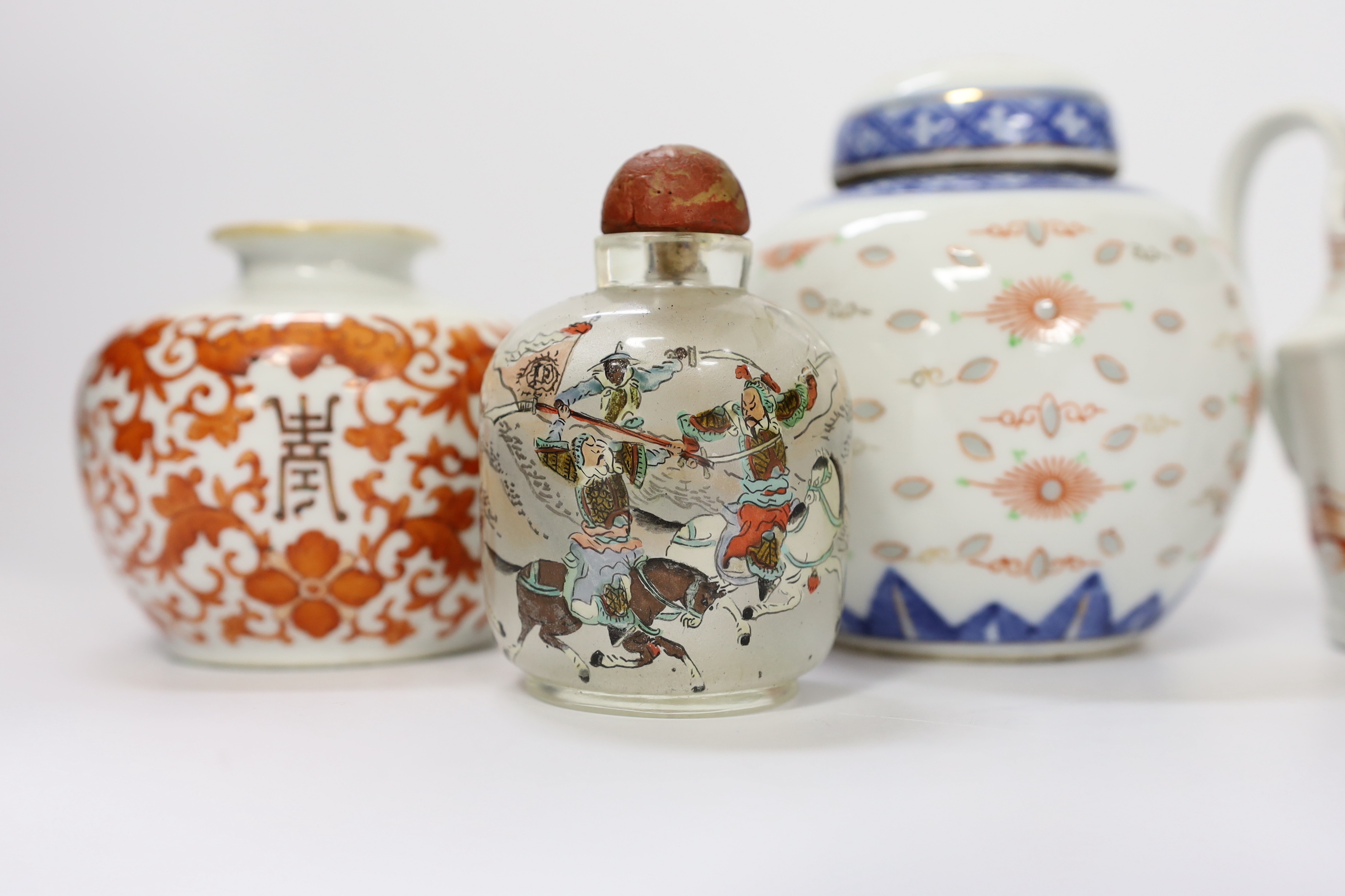 A late 18th century Newhall type jug, an early 20th century Chinese underglaze copper jar, a jar and cover and a glass snuff bottle